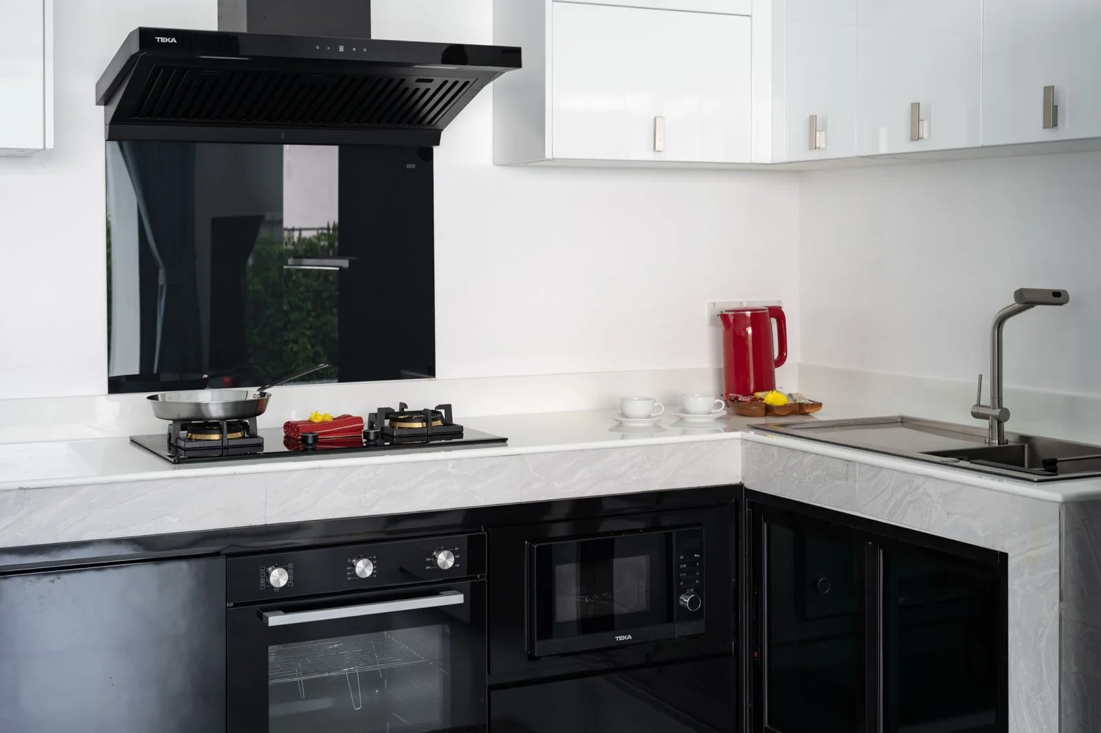 Villa kitchen with dark worktops